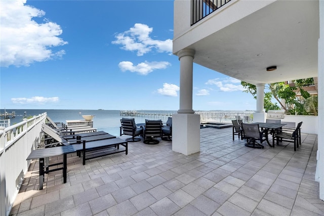 6418 Bright Bay Ct, Apollo Beach, FL 33572 - view of patio / terrace with outdoor dining space and a water view