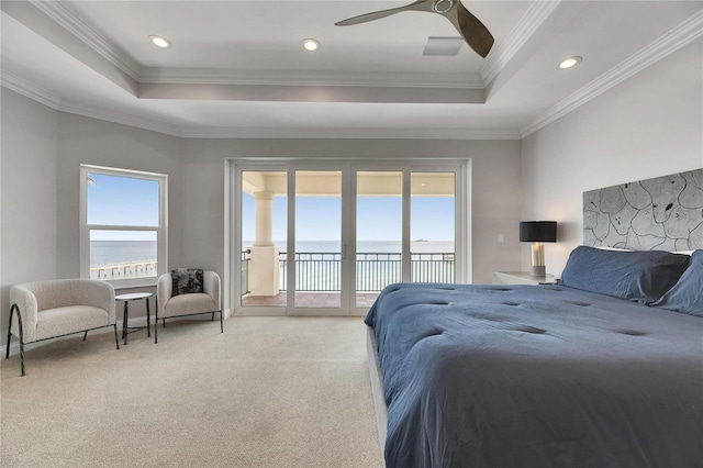 6418 Bright Bay Ct, Apollo Beach, FL 33572 - bedroom with a water view, a raised ceiling, carpet, access to exterior, and crown molding