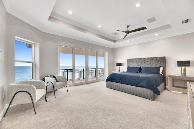 6418 Bright Bay Ct, Apollo Beach, FL 33572 - bedroom with carpet floors, a raised ceiling, ornamental molding, access to exterior, and a water view