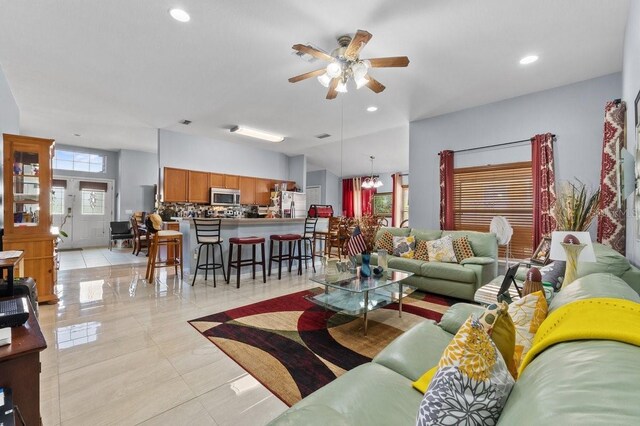 1955 Manatee Ct, Kissimmee, FL 34759 - living room featuring ceiling fan, recessed lighting, and light tile patterned floors