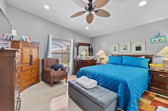 1955 Manatee Ct, Kissimmee, FL 34759 - bedroom featuring lofted ceiling, recessed lighting, ceiling fan, and light wood-style floors