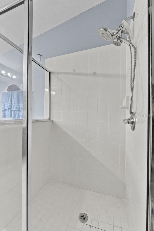 1955 Manatee Ct, Kissimmee, FL 34759 - bathroom featuring a stall shower