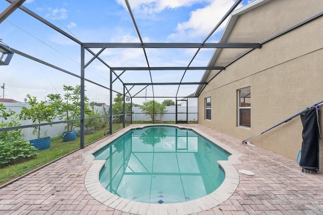 1955 Manatee Ct, Kissimmee, FL 34759 - outdoor pool featuring a patio area and glass enclosure