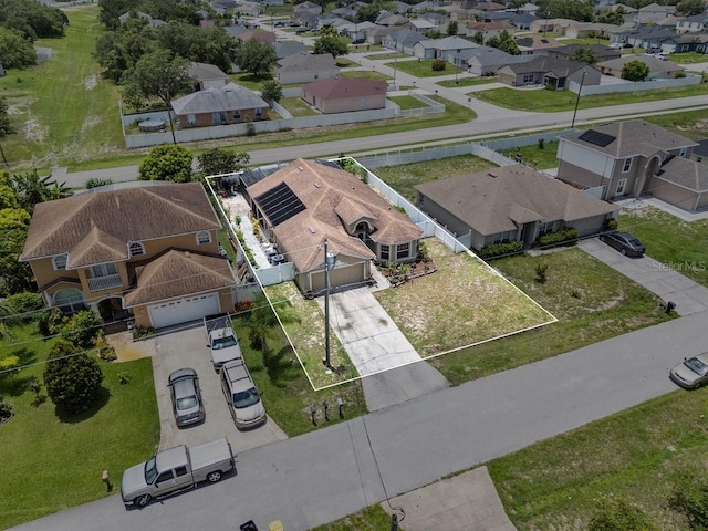 1955 Manatee Ct, Kissimmee, FL 34759 - aerial perspective of suburban area featuring property boundaries highlighted