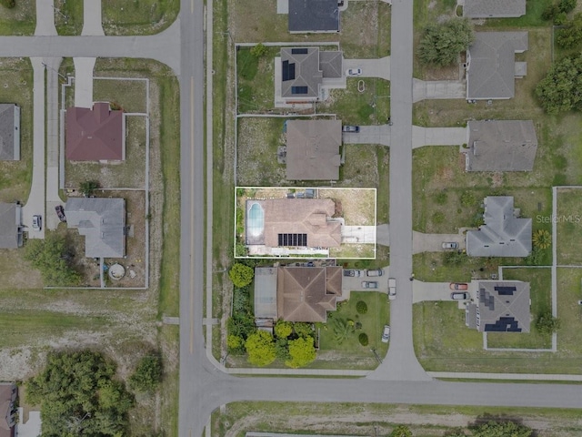 1955 Manatee Ct, Kissimmee, FL 34759 - aerial view of property and surrounding area featuring nearby suburban area