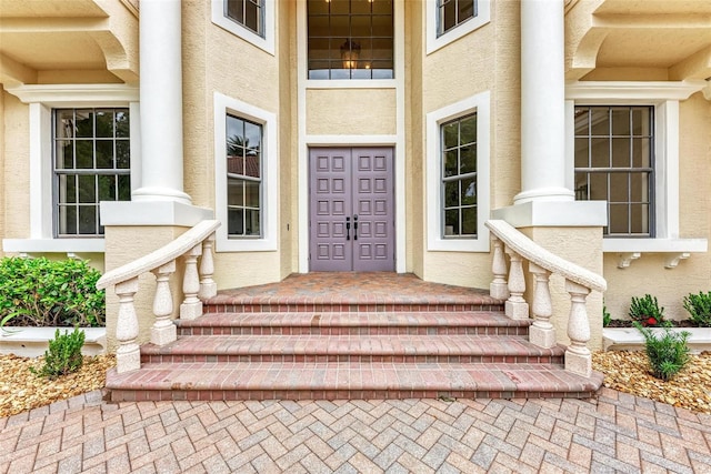 7803 Mathern Ct, Lakewood Ranch, FL 34202 - view of exterior entry with stucco siding