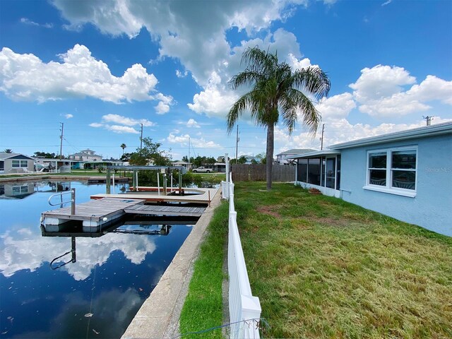 13931 King Ave, Hudson, FL 34667 - dock area with a water view and boat lift