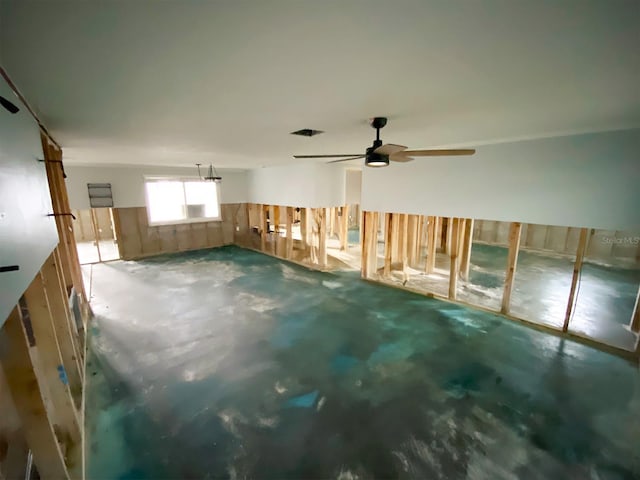 13931 King Ave, Hudson, FL 34667 - unfurnished room featuring concrete floors and a ceiling fan