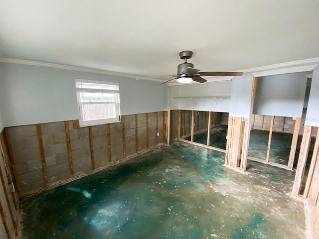13931 King Ave, Hudson, FL 34667 - spare room featuring crown molding, ceiling fan, and unfinished concrete floors