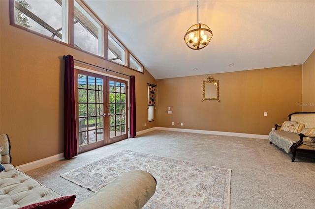 10053 W Bay St, Seminole, FL 33776 - sitting room featuring carpet flooring, a chandelier, french doors, and high vaulted ceiling