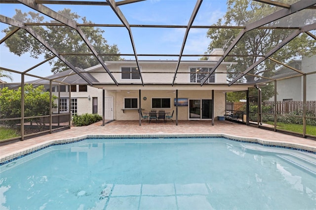 10053 W Bay St, Seminole, FL 33776 - view of swimming pool featuring a patio area and glass enclosure