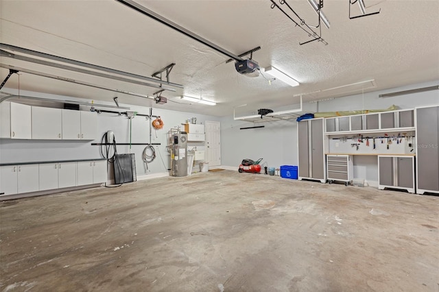10053 W Bay St, Seminole, FL 33776 - garage featuring a garage door opener and electric water heater