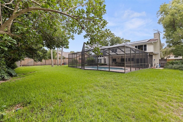 10053 W Bay St, Seminole, FL 33776 - fenced backyard with a lanai