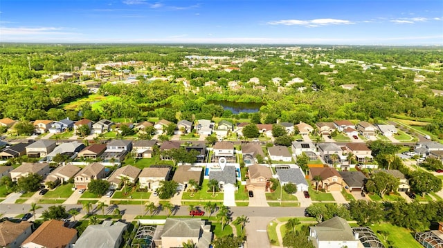 1631 Shady Oaks Dr, Oldsmar, FL 34677 - aerial perspective of suburban area with a nearby body of water