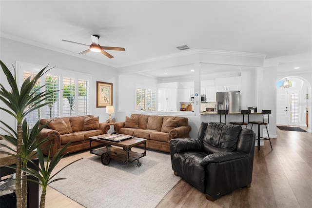 1631 Shady Oaks Dr, Oldsmar, FL 34677 - living room featuring ceiling fan, wood finished floors, crown molding, and recessed lighting