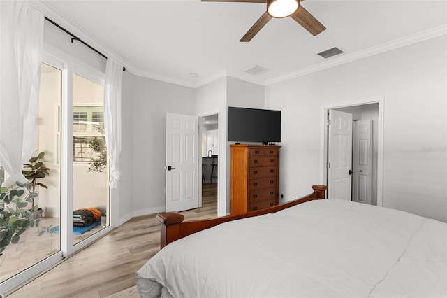 1631 Shady Oaks Dr, Oldsmar, FL 34677 - bedroom with light wood-style floors, crown molding, and a ceiling fan