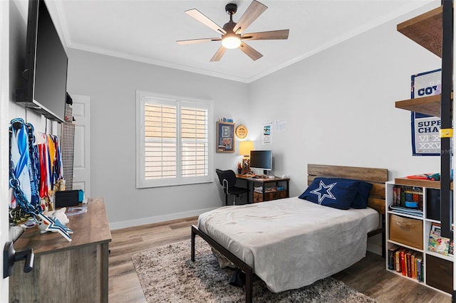 1631 Shady Oaks Dr, Oldsmar, FL 34677 - bedroom with wood finished floors, crown molding, and ceiling fan