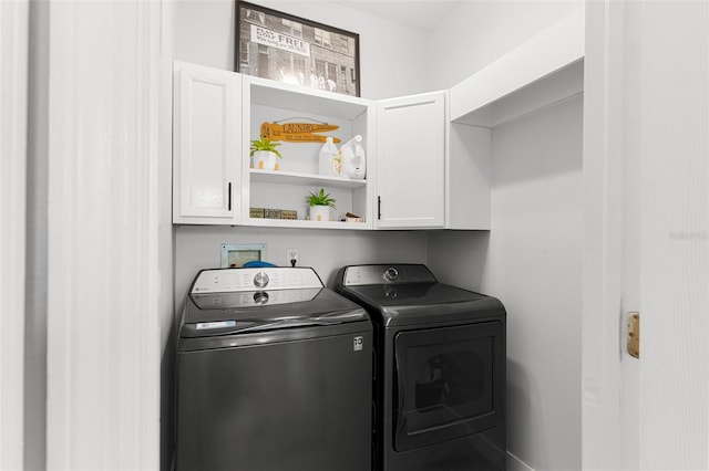 1631 Shady Oaks Dr, Oldsmar, FL 34677 - laundry room with washing machine and clothes dryer and cabinet space