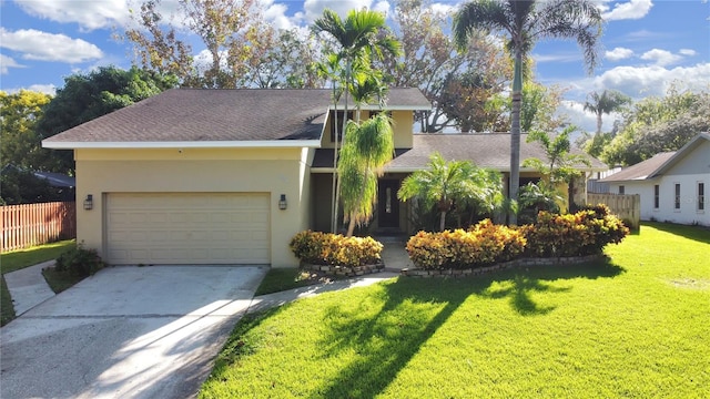 852 Village Way, Palm Harbor, FL 34683 - view of front of home with an attached garage, stucco siding, and concrete driveway