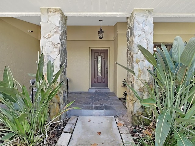 852 Village Way, Palm Harbor, FL 34683 - entrance to property featuring stone siding and stucco siding
