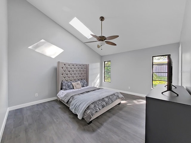 852 Village Way, Palm Harbor, FL 34683 - bedroom with a skylight, wood finished floors, high vaulted ceiling, and ceiling fan