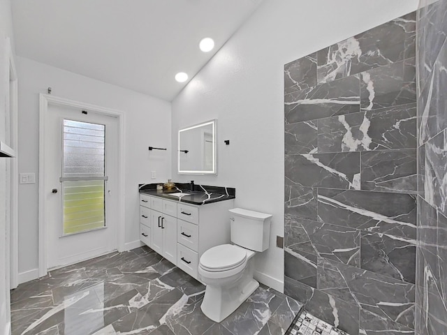 852 Village Way, Palm Harbor, FL 34683 - full bath with vanity, marble finish floors, recessed lighting, and vaulted ceiling