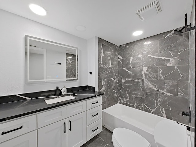 852 Village Way, Palm Harbor, FL 34683 - full bathroom with vanity, marble look tile flooring, shower / bath combination, and recessed lighting