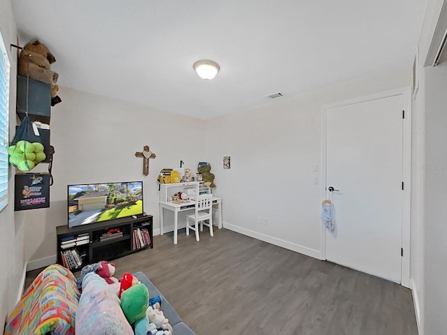 852 Village Way, Palm Harbor, FL 34683 - playroom with wood finished floors and baseboards