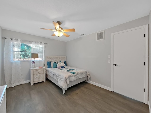 852 Village Way, Palm Harbor, FL 34683 - bedroom with wood finished floors and ceiling fan