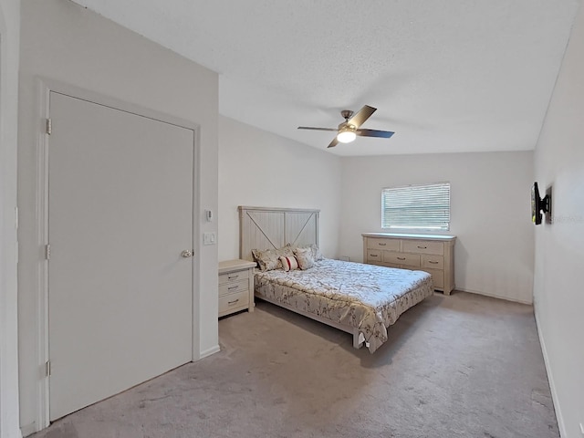 852 Village Way, Palm Harbor, FL 34683 - bedroom featuring light colored carpet and a ceiling fan