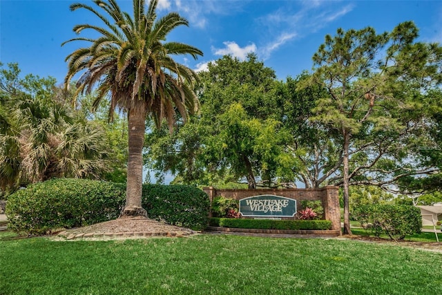 852 Village Way, Palm Harbor, FL 34683 - community / neighborhood sign featuring a lawn