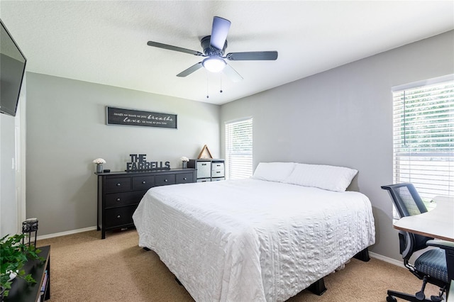4132 Festival Pointe Blvd, Mulberry, FL 33860 - bedroom with light carpet and a ceiling fan