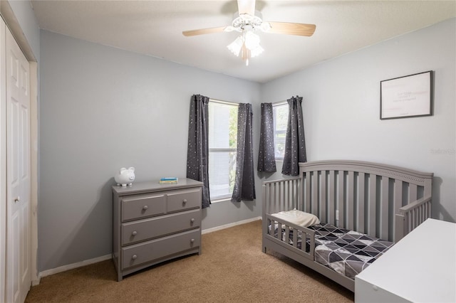 4132 Festival Pointe Blvd, Mulberry, FL 33860 - carpeted bedroom with a closet and a ceiling fan