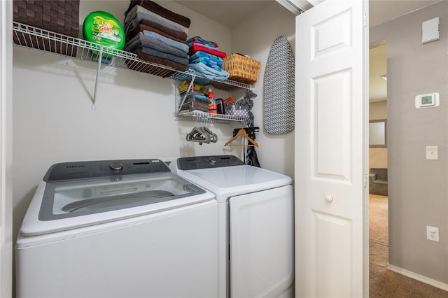 4132 Festival Pointe Blvd, Mulberry, FL 33860 - laundry area featuring washing machine and clothes dryer and carpet floors