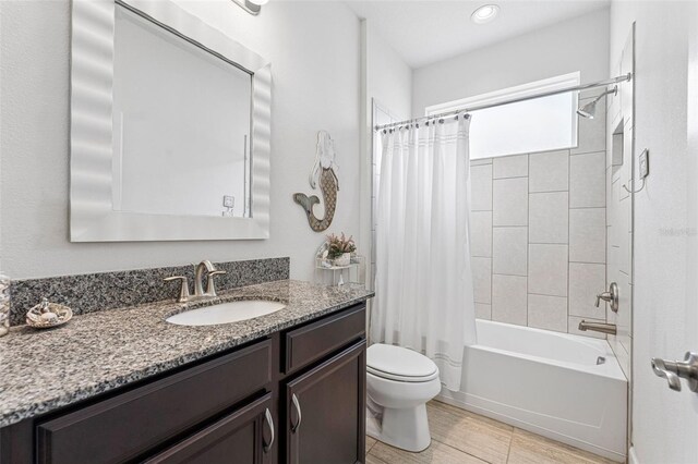 1237 Windy Bay Shl, Tarpon Springs, FL 34689 - bathroom featuring vanity and shower / tub combo