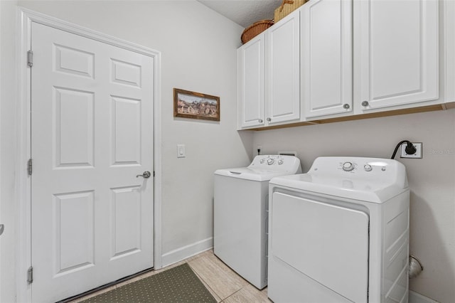 1237 Windy Bay Shl, Tarpon Springs, FL 34689 - laundry room featuring cabinet space and washing machine and clothes dryer