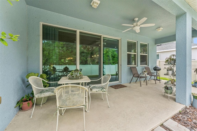 1237 Windy Bay Shl, Tarpon Springs, FL 34689 - view of patio featuring ceiling fan and outdoor dining area