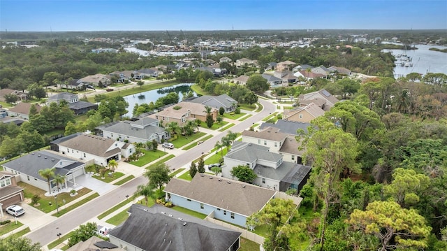 1237 Windy Bay Shl, Tarpon Springs, FL 34689 - aerial view of residential area featuring a large body of water