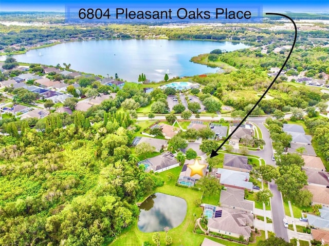 6804 Pleasant Oaks Pl, Riverview, FL 33578 - aerial view of residential area featuring a large body of water