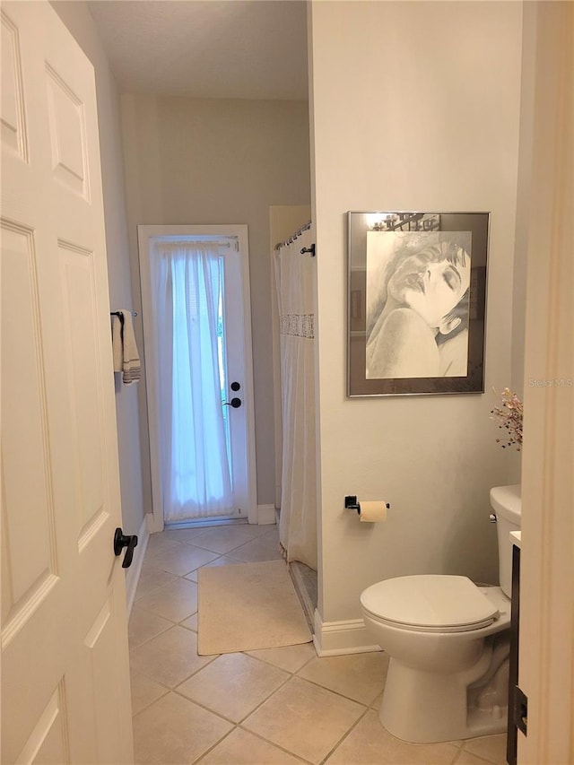 6804 Pleasant Oaks Pl, Riverview, FL 33578 - bathroom featuring tile patterned flooring and curtained shower