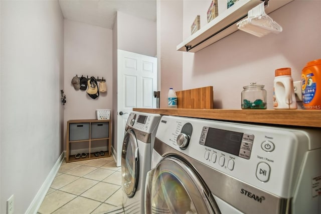 6804 Pleasant Oaks Pl, Riverview, FL 33578 - laundry room featuring washing machine and clothes dryer and light tile patterned floors