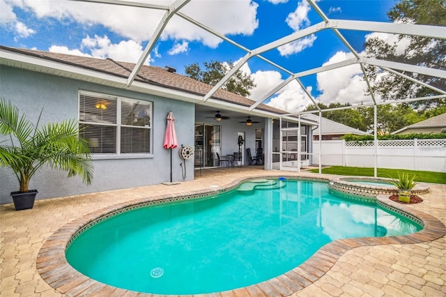 6804 Pleasant Oaks Pl, Riverview, FL 33578 - view of pool with ceiling fan, a patio area, glass enclosure, and a pool with connected hot tub