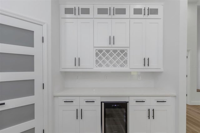 1213 E Lemon St, Tarpon Springs, FL 34689 - indoor dry bar with wine cooler and wood finished floors