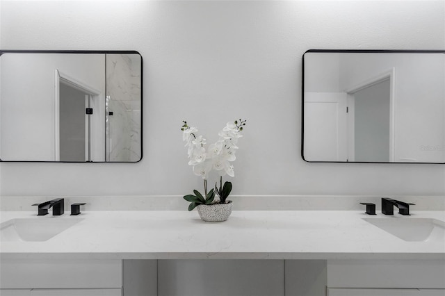 1213 E Lemon St, Tarpon Springs, FL 34689 - bathroom featuring double vanity and a shower