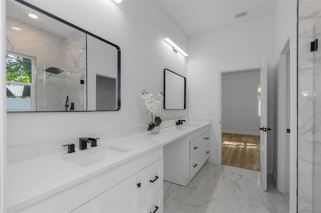 1213 E Lemon St, Tarpon Springs, FL 34689 - bathroom featuring double vanity, a marble finish shower, marble finish floors, and recessed lighting