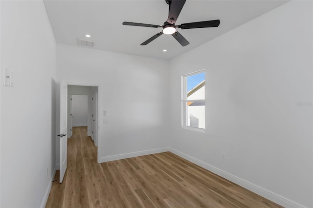 1213 E Lemon St, Tarpon Springs, FL 34689 - unfurnished room with light wood-style floors, ceiling fan, and recessed lighting