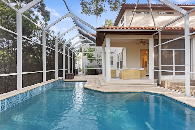 3307 W Knights Ave, Tampa, FL 33611 - outdoor pool featuring a patio, ceiling fan, an outdoor hangout area, and glass enclosure