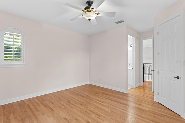 3307 W Knights Ave, Tampa, FL 33611 - spare room featuring light wood-style floors and a ceiling fan