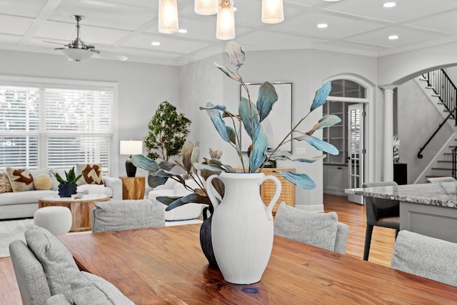 3307 W Knights Ave, Tampa, FL 33611 - dining room with coffered ceiling, wood finished floors, decorative columns, stairway, and recessed lighting