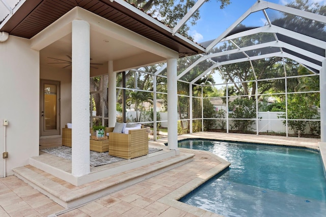 3307 W Knights Ave, Tampa, FL 33611 - view of pool featuring ceiling fan, a patio, and glass enclosure